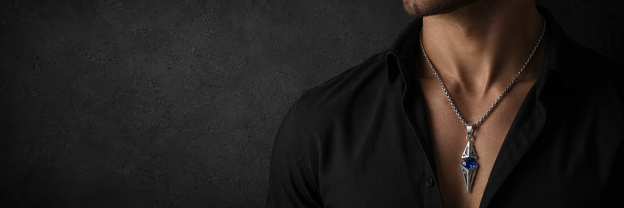 ZAFT Axis necklace styled on a man against dark stone collection