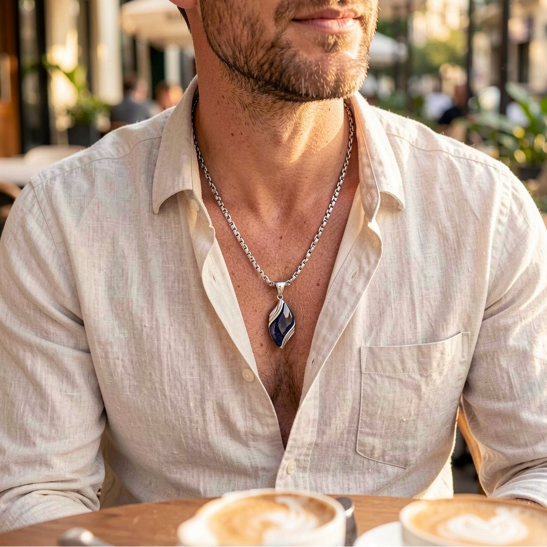 Nebula necklace worn with a light linen shirt at a cafe