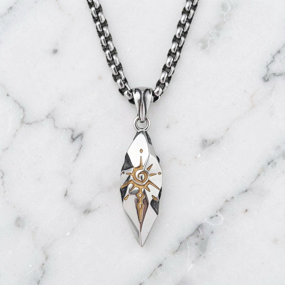 Sigil Quicksilver necklace arranged on white marble