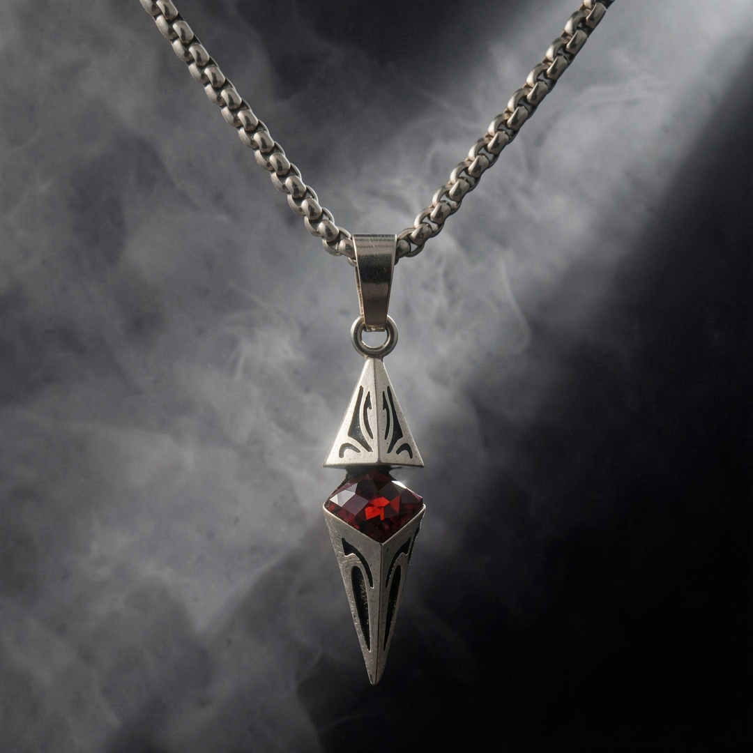 Axis Ruby necklace suspended in a smoky dark setting