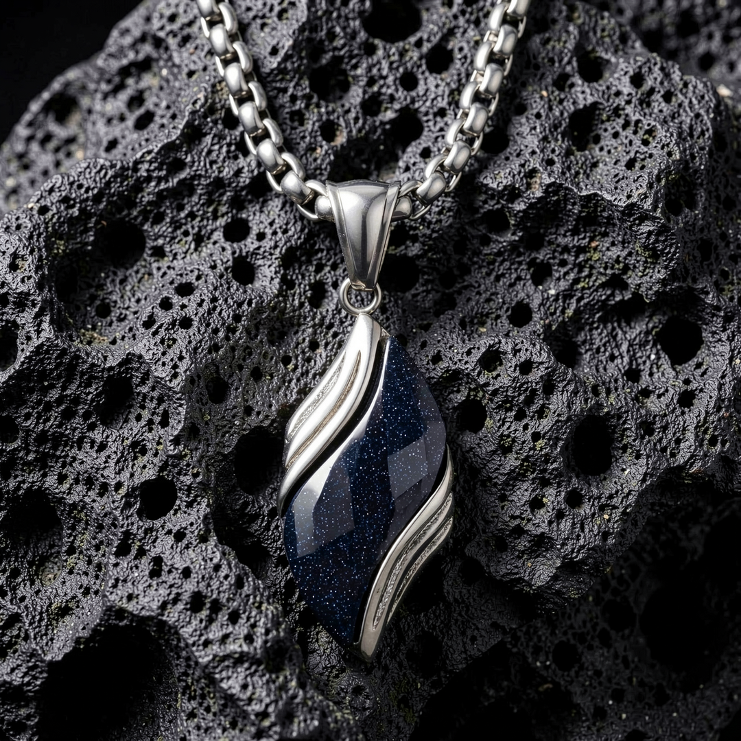 Nebula necklace arranged on porous black stone