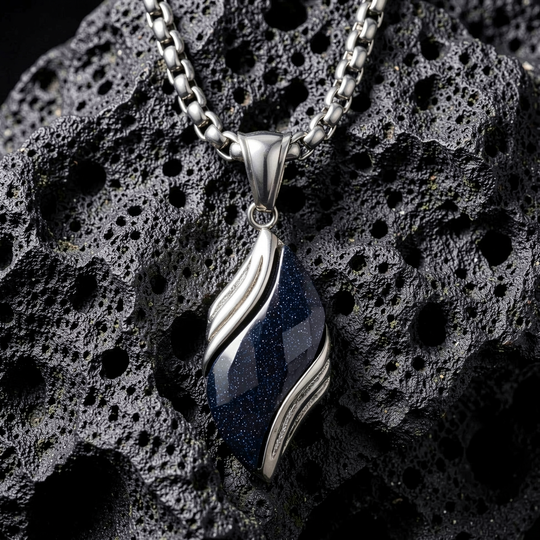 Nebula necklace arranged on porous black stone