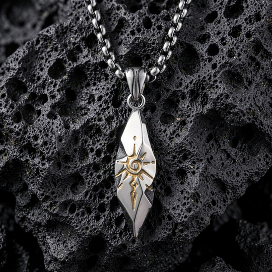 Sigil Quicksilver pendant arranged on porous black stone