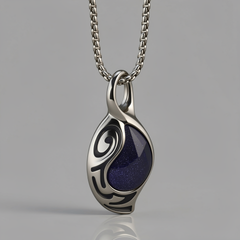 Vortex Cosmos pendant presented in a neutral grey studio