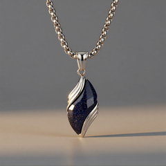 Nebula pendant suspended in a neutral grey studio