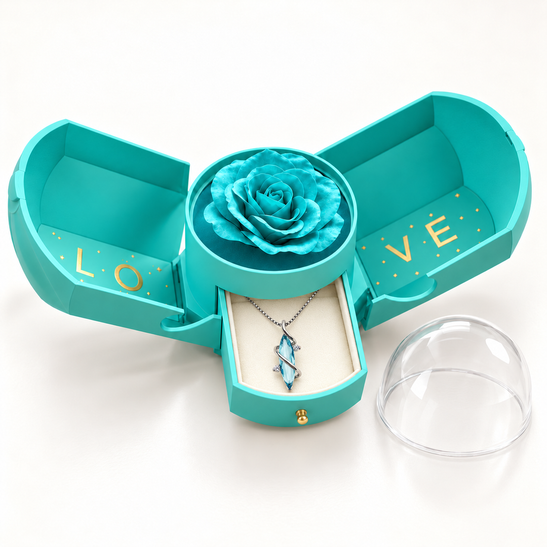 Aethera Frost necklace in its open light blue Rose Box, with the removable clear dome beside it