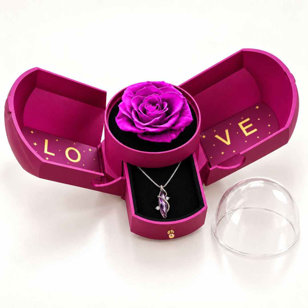 Aethera Violet necklace in its open purple Rose Box, with the removable clear dome beside it