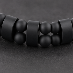 Array Stealth matte black double-row bead and spacer construction macro