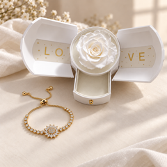 Blossom gold bracelet beside the optional White Rose Box with open doors and lower drawer