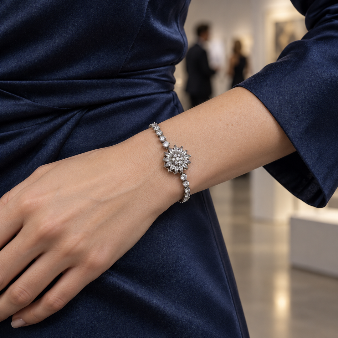 Blossom Silver bracelet worn with a navy satin sleeve for an evening out