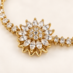 Blossom gold bracelet flower close-up, showing clear marquise petals and raised floral setting