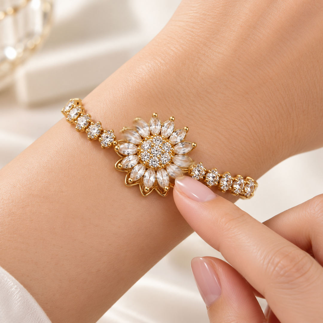 Illustration of the Blossom gold bracelet flower turning with a gentle fingertip touch