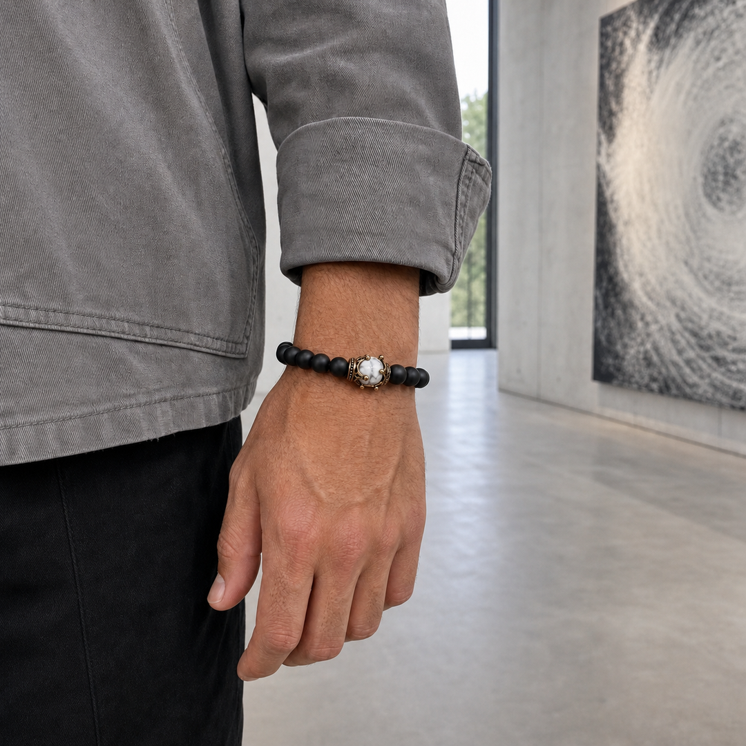 ZAFT CREST Eclipse bracelet worn with a stone grey weekend jacket