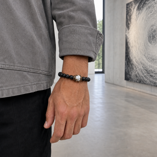 ZAFT CREST Eclipse bracelet worn with a stone grey weekend jacket