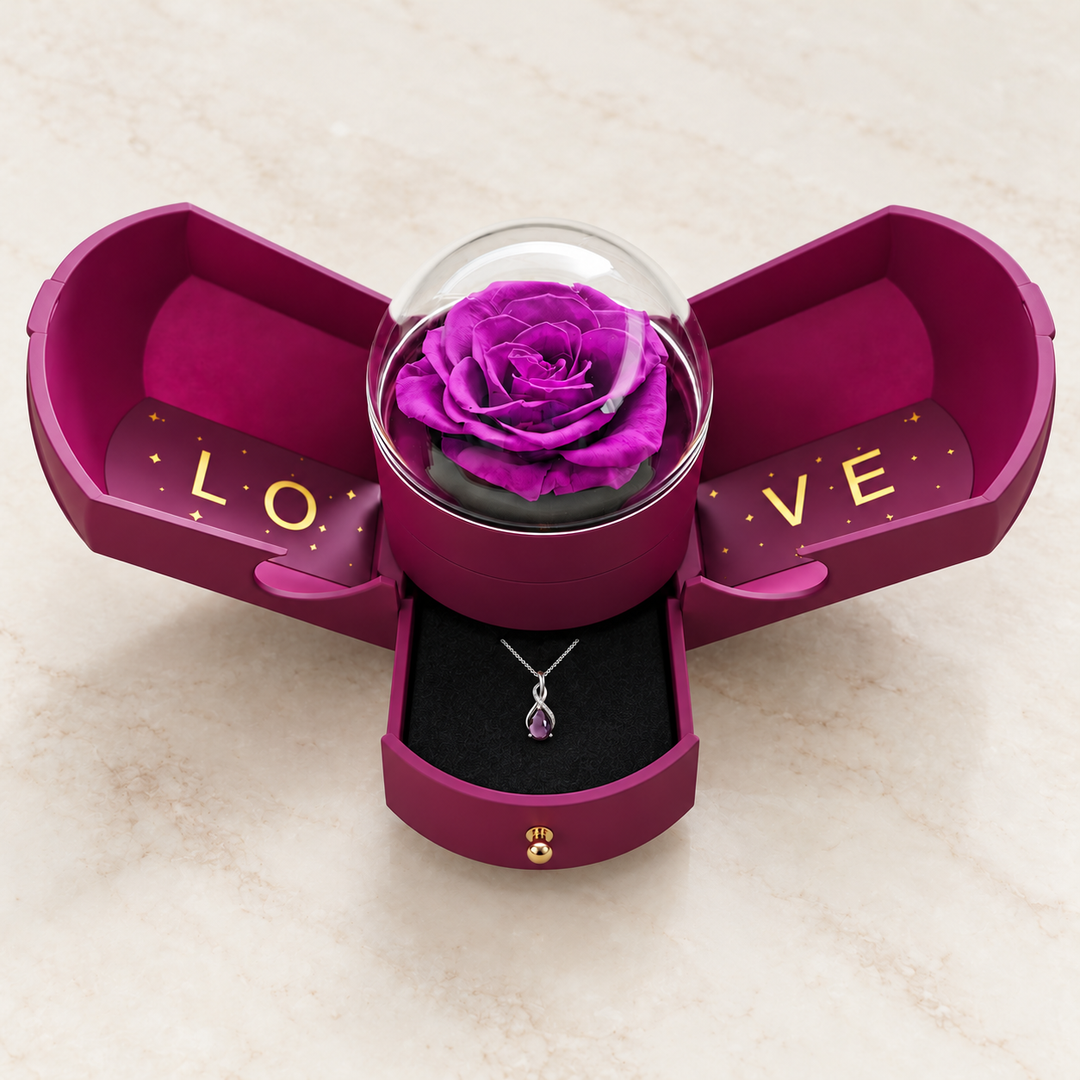 Drop Violet necklace in its optional purple Rose Box, with the rose under its dome and the jewellery drawer open