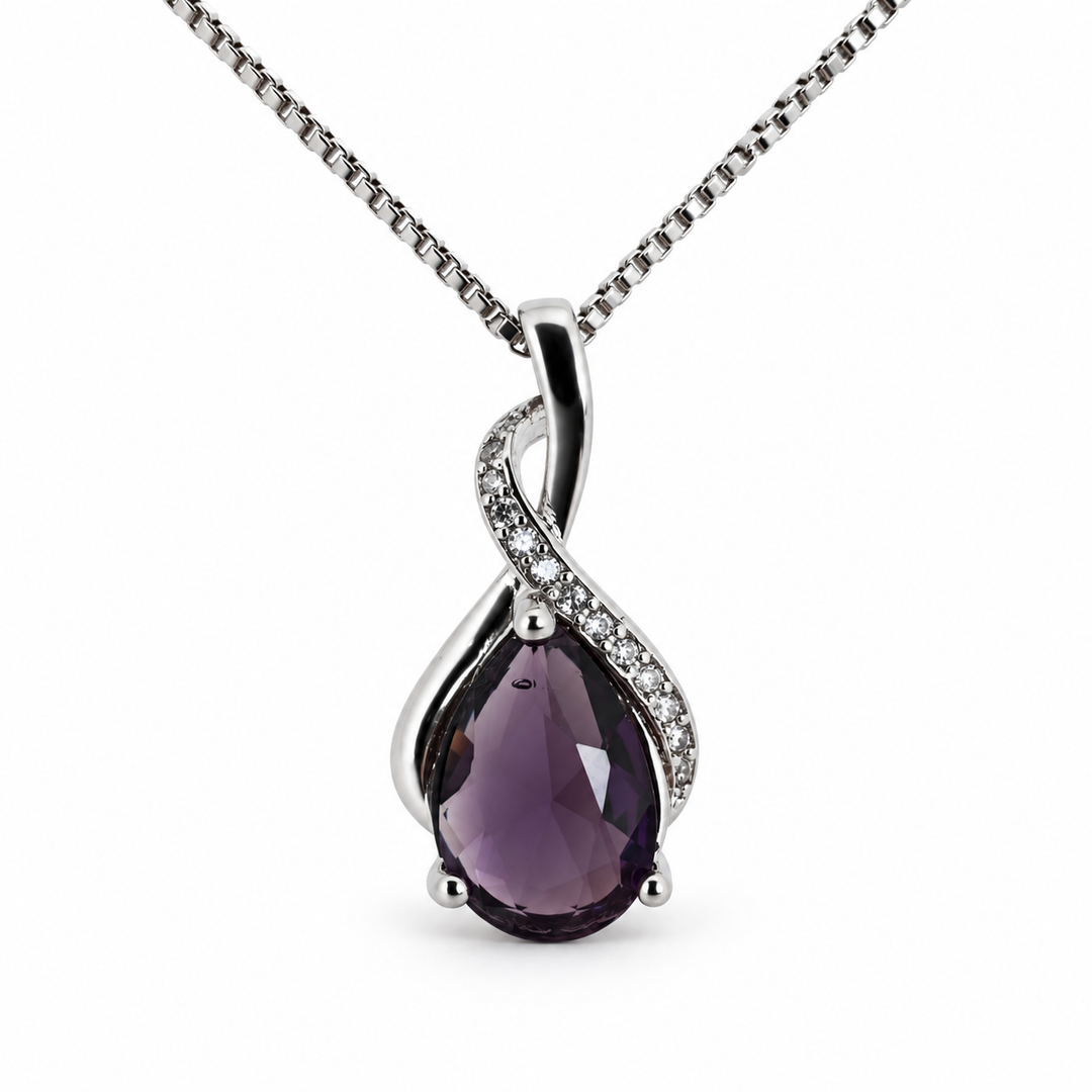 Drop violet necklace, showing the faceted pear-shaped centre and flowing silver setting on white