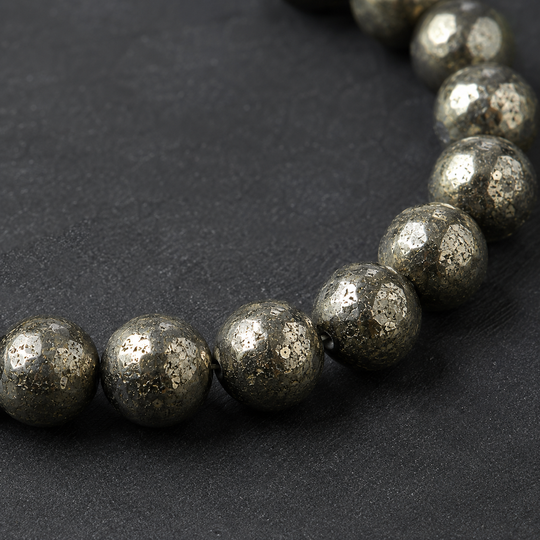 Vestige Mercury round natural pyrite beads macro detail