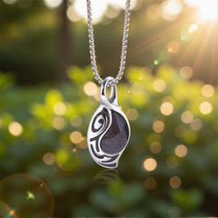 Vortex Cosmos pendant suspended outdoors in warm backlight