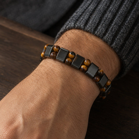 Array Wheat double-row bracelet worn with a graphite cuff