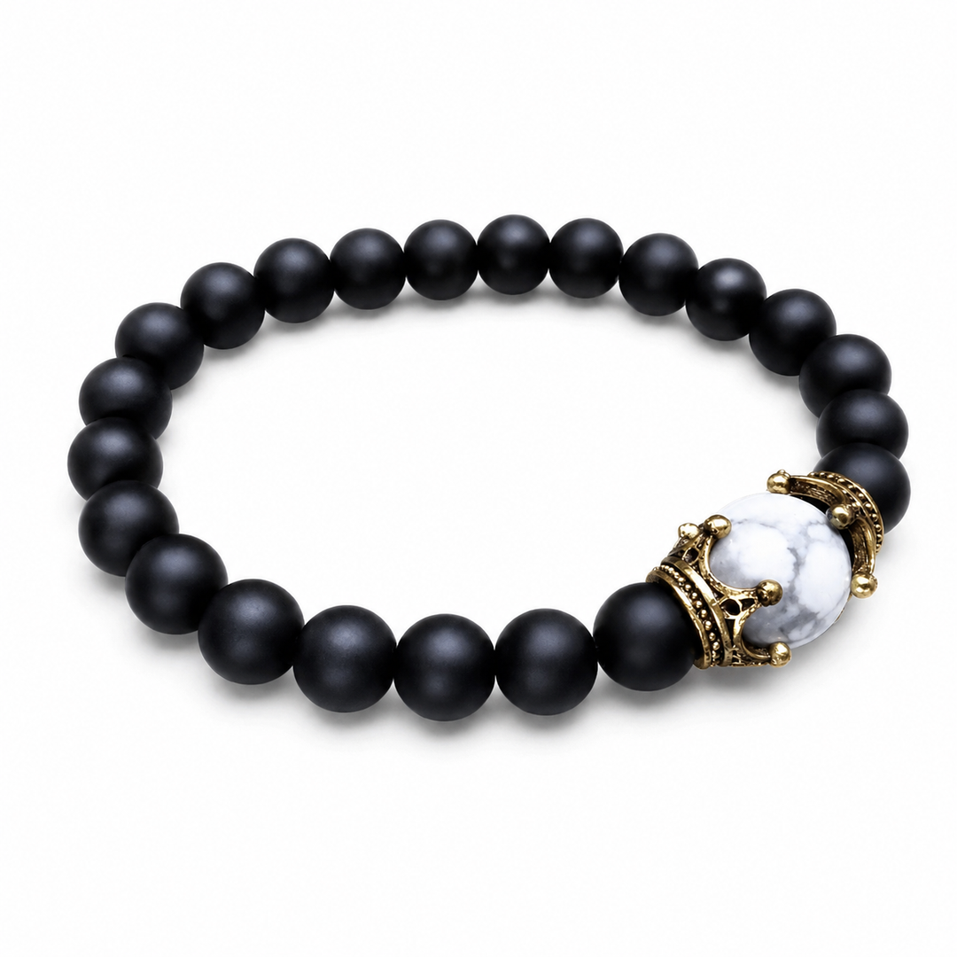 Crest Eclipse matte-black bracelet with white marbled crown centre on white background