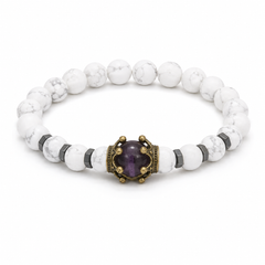 Crest Lunar white marbled and purple crown bracelet on white background