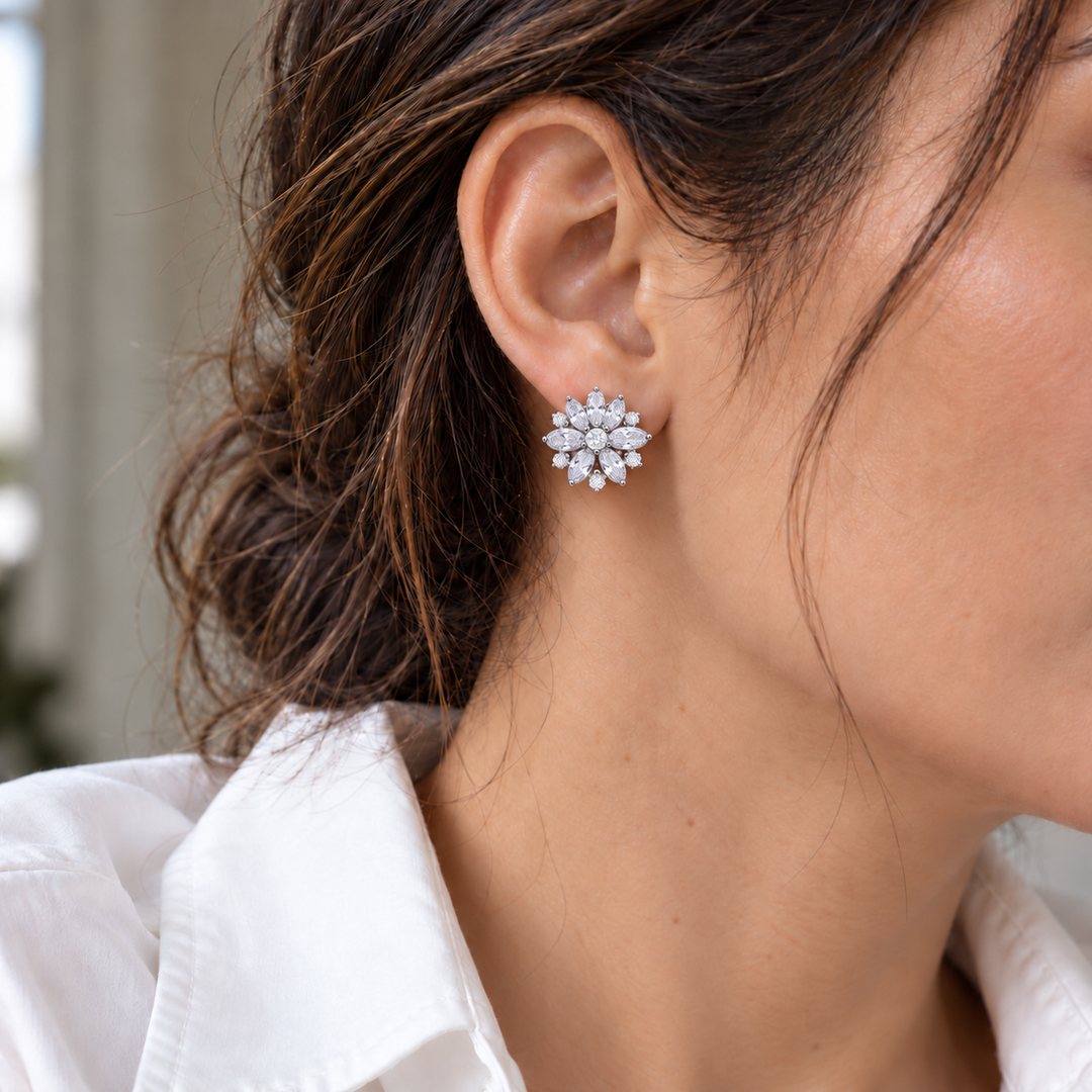 Dahlia Clear flower stud worn with a white shirt; approximately 20 mm flower face.