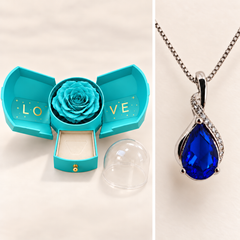Drop Cobalt necklace detail and coordinated light blue Rose Box shown in separate views