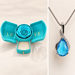 Drop Sky necklace detail and coordinated light blue Rose Box shown in separate views