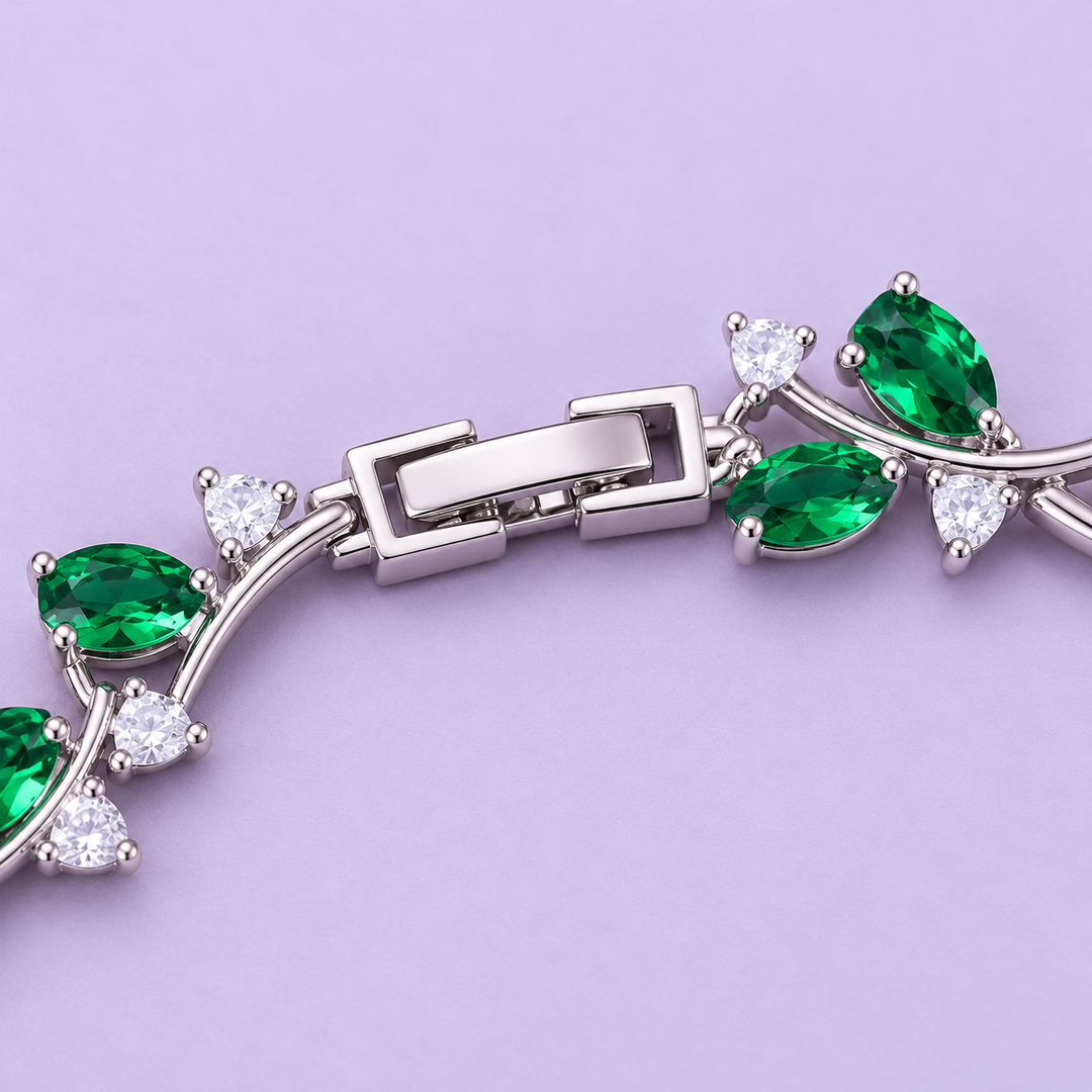 Close detail of Eden’s closed rectangular clasp and adjacent Fern leaf links in a silver-tone finish.