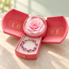 Eden Rose Silver-tone bracelet in an open Pink Rose Box, shown from an angled view with the clear dome in place