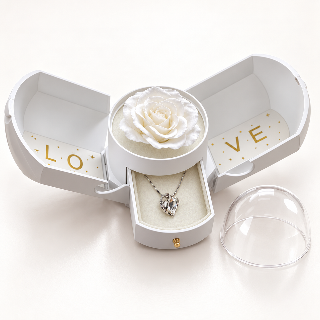 Embrace clear necklace in its matching Rose Box, with the sides open, drawer extended and removable clear dome alongside.