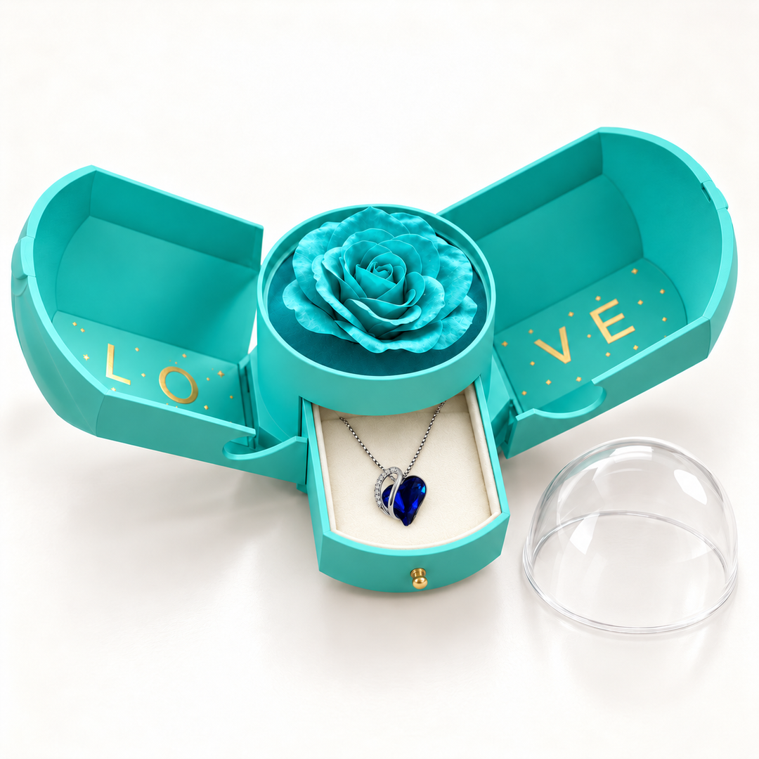 Embrace cobalt necklace in its assigned Rose Box, open with the jewellery drawer extended and clear dome removed.