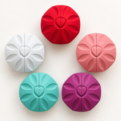 Overhead view of the Rose Box in red, white, pink, light blue and purple.