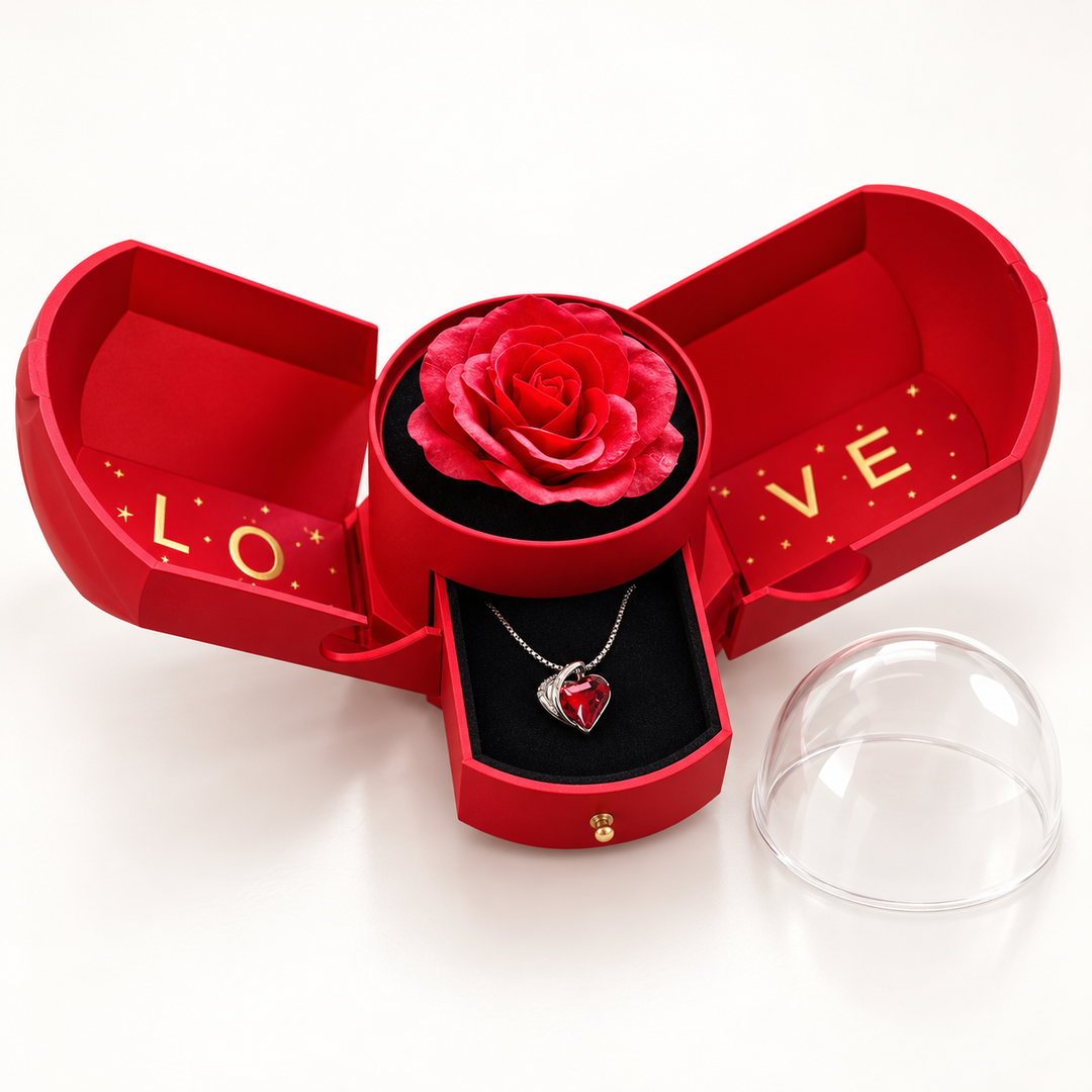 Embrace scarlet necklace in its matching Rose Box, with the sides open, drawer extended and removable clear dome alongside.