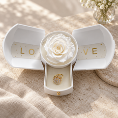 Petal in Gold resting inside the open drawer of the White Rose Box