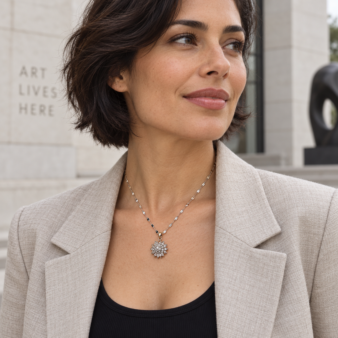 Flora Silver necklace styled with a tailored blazer outside a gallery