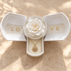Flora Gold necklace in the lower drawer of its optional white Rose Box