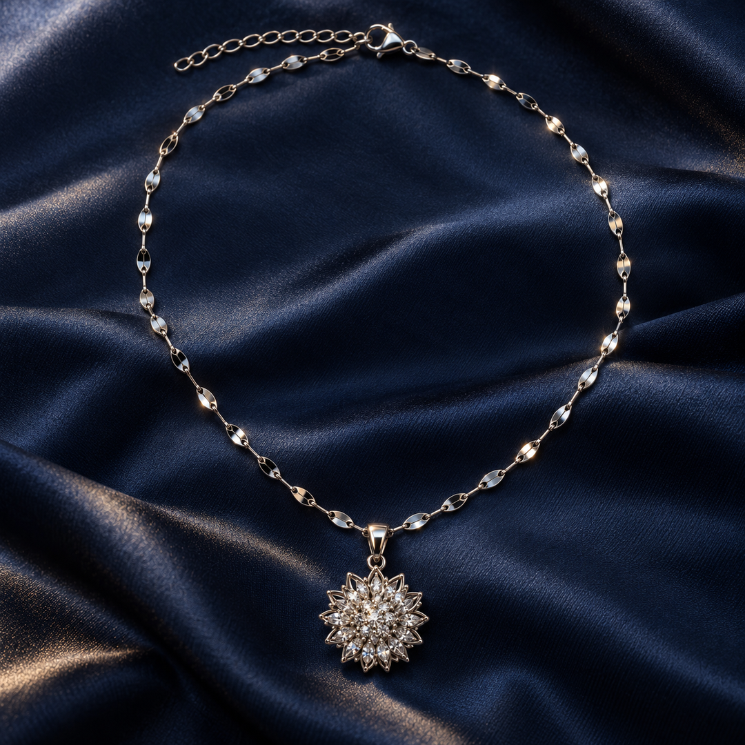 Flora Silver necklace and clasp arranged on midnight blue silk