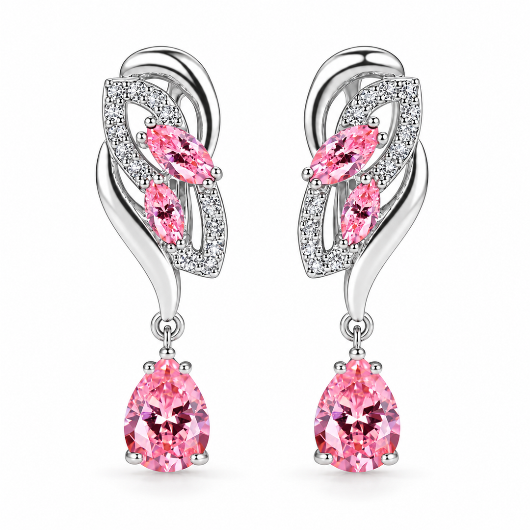 Iris Drop Earrings in Blush, a matching pair with a silver leaf-inspired setting and faceted pear drops on white