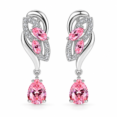 Iris Drop Earrings in Blush, a matching pair with a silver leaf-inspired setting and faceted pear drops on white