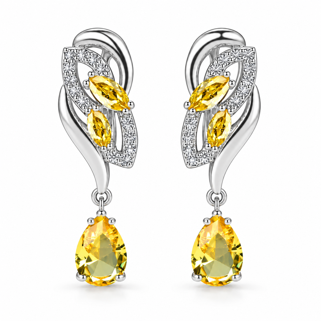 Iris Drop Earrings in Citron, a matching pair with a silver leaf-inspired setting and faceted pear drops on white