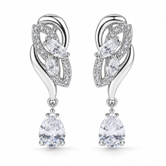 Iris Drop Earrings in Clear, a matching pair with a silver leaf-inspired setting and faceted pear drops on white