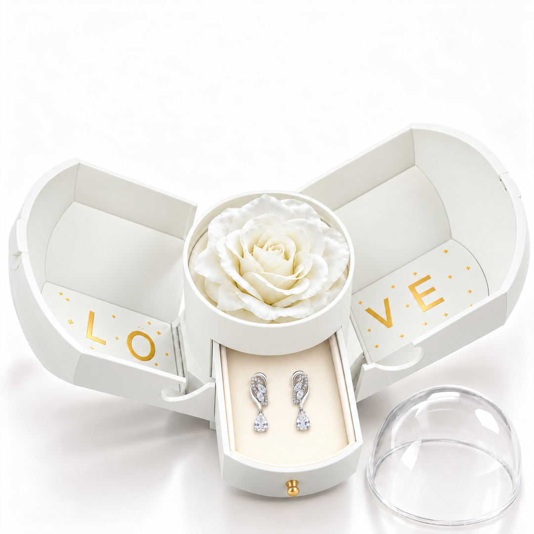 Iris Clear Silver earrings, one pair in the open white Rose Box drawer, with the matching rose and clear dome alongside