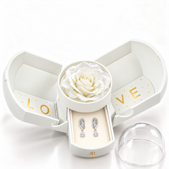 Iris Clear Silver earrings, one pair in the open white Rose Box drawer, with the matching rose and clear dome alongside