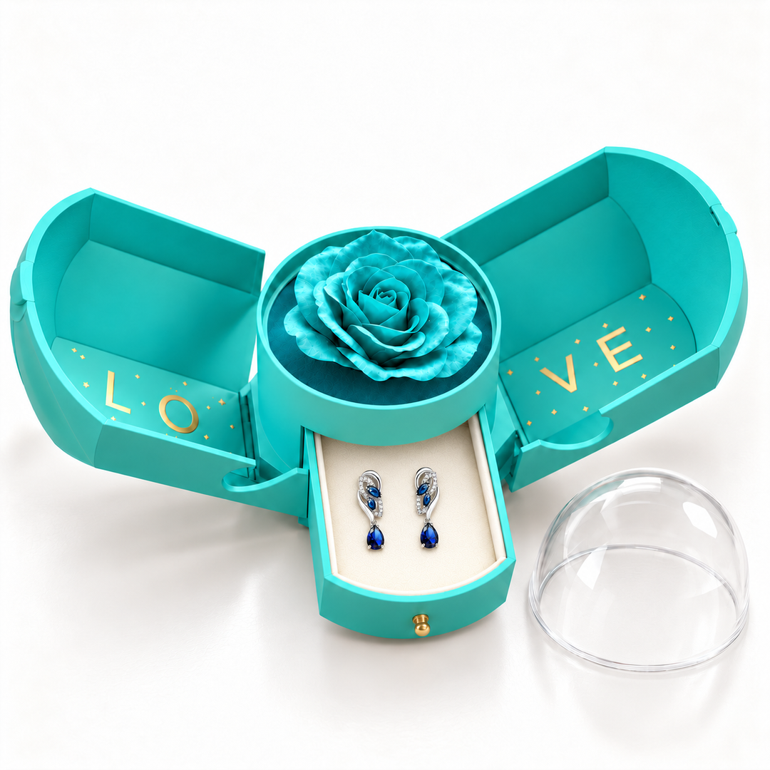Iris Cobalt Silver earrings, one petite pair in the drawer of the open light blue Rose Box, with its rose and removable clear dome