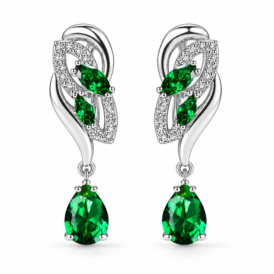 Iris Drop Earrings in Forest, a matching pair with a silver leaf-inspired setting and faceted pear drops on white