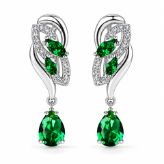 Iris Drop Earrings in Forest, a matching pair with a silver leaf-inspired setting and faceted pear drops on white