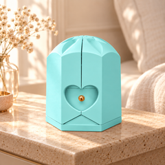 Closed light blue Rose Box with sculpted crown and heart detail on pale stone