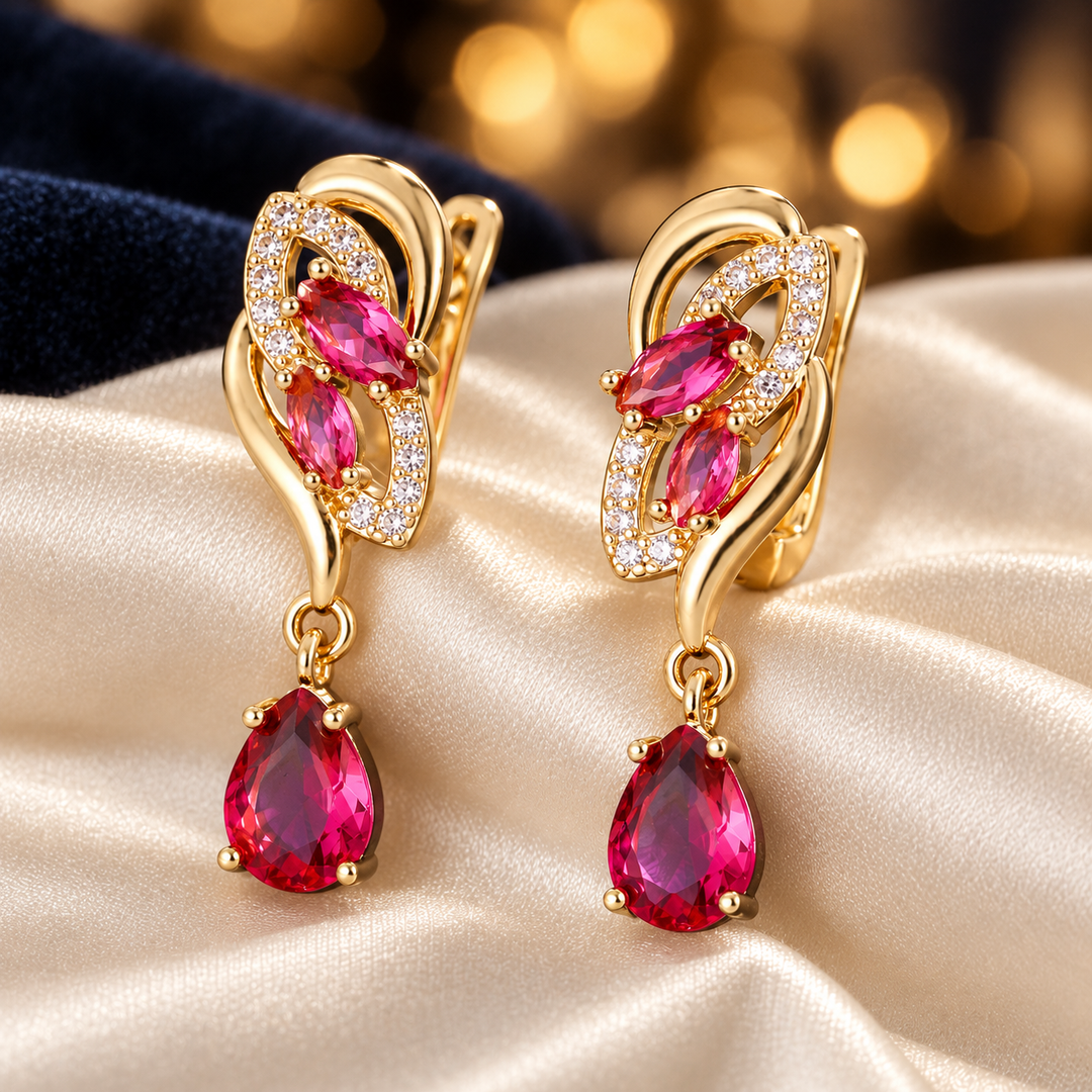 Iris Scarlet Gold earrings styled on ivory silk