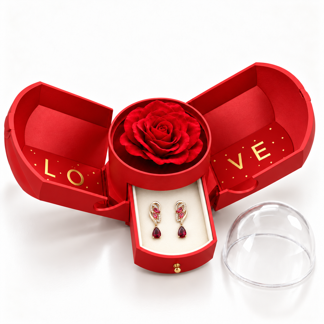 Iris Scarlet Gold earrings, one pair in the open red Rose Box drawer, with matching rose and clear dome alongside
